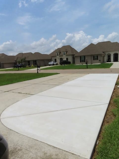 Completed concrete driveway extension