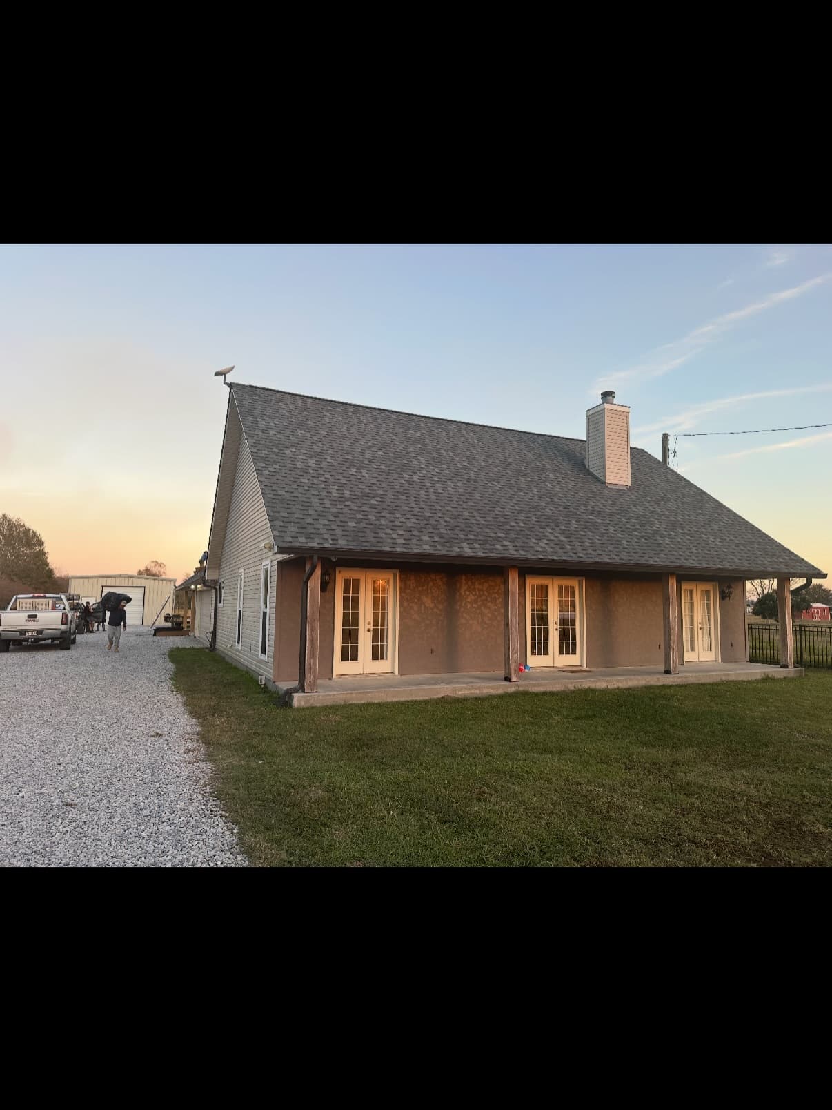 Finished shingle roof at dusk